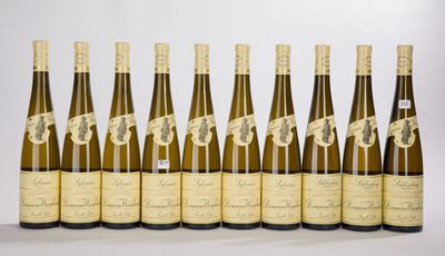 a group of six bottles of wine sitting next to each other
