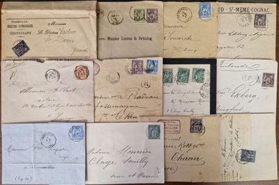 several old envelopes are stacked on top of each other on a table