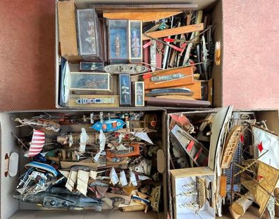 a box full of assorted items sitting on the floor