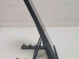 a cell phone that is sitting on a stand