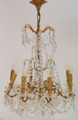 a chandelier hanging from the ceiling in a room