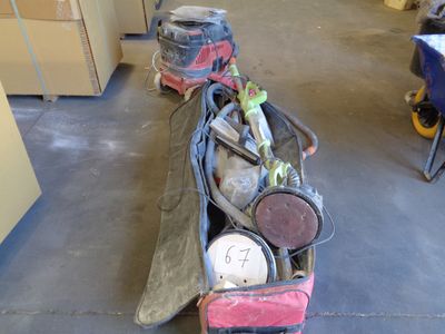 a pile of luggage sitting on the floor in a room