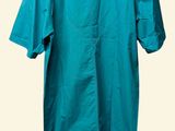 blue shirt on a hanger on a white background