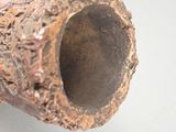 a small pipe that is sitting on a table