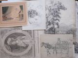 many drawings of horses and carriages on a table