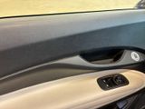 a close up of a door handle in a car