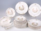 a lot of plates and cups on the table