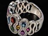 an image of a close up of a ring with different colored stones