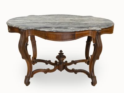 Table de milieu de forme violonnée, en palissandre, reposant…
