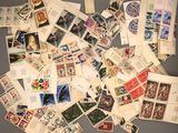 many different types of stamps on the table