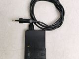 a small charger attached to a charger on a table