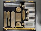 a case with a lot of glass items inside of it