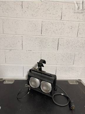 a black table with two lights on top of it