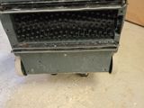 a toaster that is sitting on the floor in the kitchen