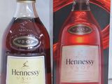 bottle of hennessy cognal next to box of brandy