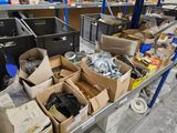 many boxes of assorted items on a metal table