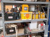 a shelf with many different items on it in a garage