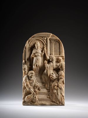 a carved ivory plaque depicting a scene from the life of jesus