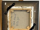 a picture of a picture on a easel with a piece of paper taped to it