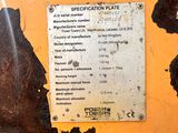 a sign on the side of a machine that says specification plate