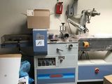 a machine that is sitting in the corner of a room
