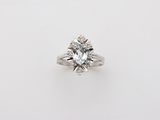 an oval aquamarinee and diamond ring