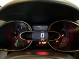 a close up of a car dashboard with a clock on it