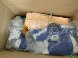 a box full of clothes and a cell phone in it