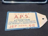 a luggage tag on the back of a luggage bag