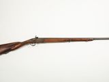 a rifle with a wooden barrel on a white background