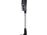 un aspirateur noir et argenté sur fond blanc