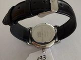 an image of a wrist watch with a price tag attached to it