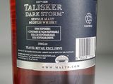 a label on a bottle of whiskey on a table