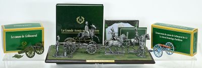 a display of various items that include a horse drawn carriage and other items