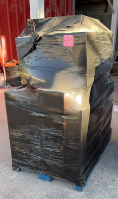 a large black box sitting on top of a pallet
