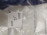 a plastic bag with a label on it sitting on a table