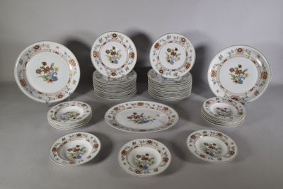 a lot of plates that are sitting on a table