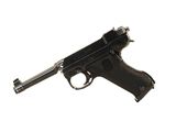 une image représentant un pistolet posé sur une surface blanche