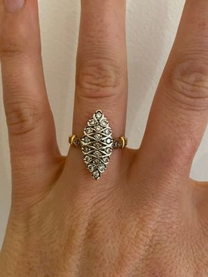 Bague en or jaune et or gris 750 millièmes sertie d'un pavag…