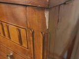 an old wooden table with a drawer on top of it