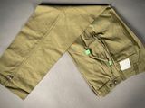 a close up of a pair of khaki pants on a table