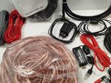 a box of wires, cables, and other electrical equipment on the table