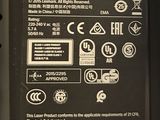 a close up of the back of a laptop charger