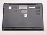 a laptop that is sitting on a white table