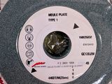 a picture of a plate with a piece of paper on it