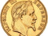 gros plan d'une pièce d'or sur laquelle figure le visage d'un homme