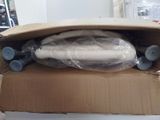 a cardboard box that has a skateboard inside of it