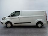 a white van that is parked in a parking lot