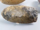 a rock and a piece of bread next to each other