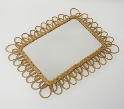 an image of a square mirror with a rope frame on it